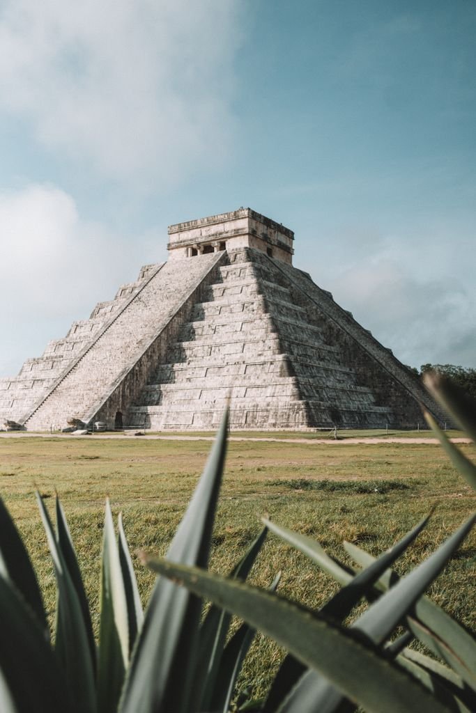 Explore the iconic El Castillo pyramid at Chichen Itza, a remarkable Mayan monument in Mexico.