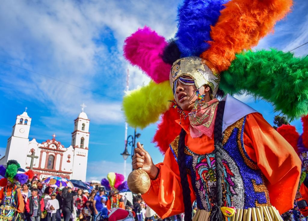 Colorful traditional festival with elaborate costumes in Atlacomulco, Mexico.