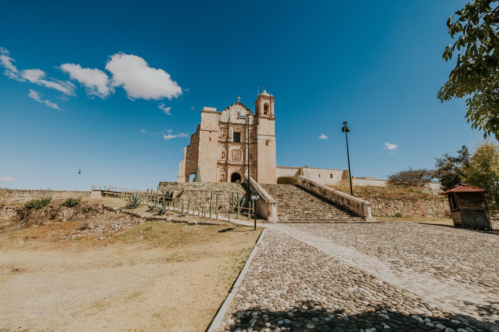 Discover the timeless beauty of Santo Domingo Yanhuitlan's historic church under a clear blue sky.